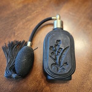 vintage or Art Deco style black glass perfume atomizer bottle with a bulb